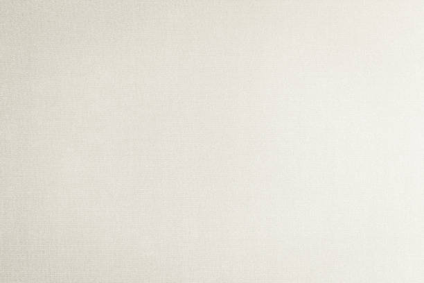 istock Cotton silk blended fabric wallpaper texture pattern background in pastel cream beige color tone 1184268807