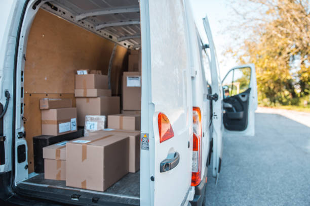 istock Delivery van full of packages 1184269434