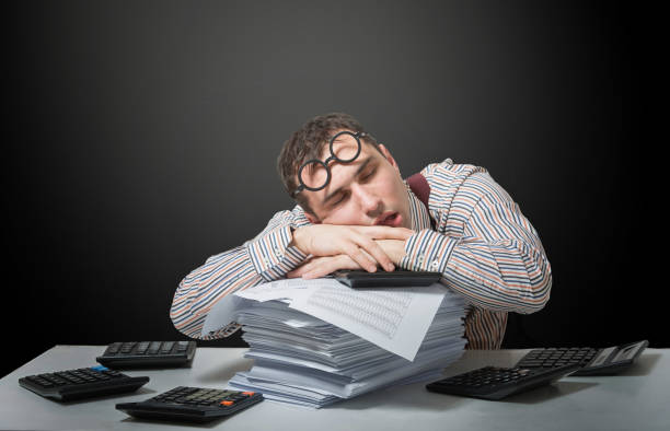 istock Tired accountant, humorous portrait 1184270213