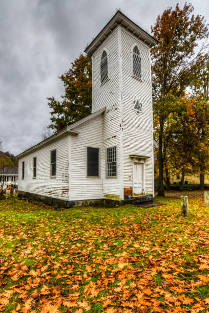 istock Old White Church in Autumn 1184270712