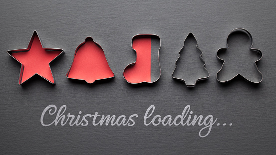 Christmas loading background card with christmas cookie cutters