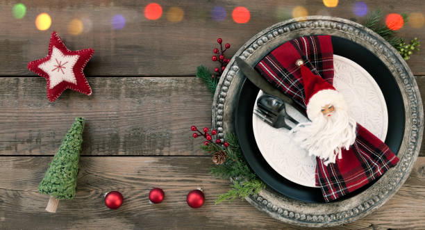 istock Christmas Dining Plate on an Old Wood Table 1184271771