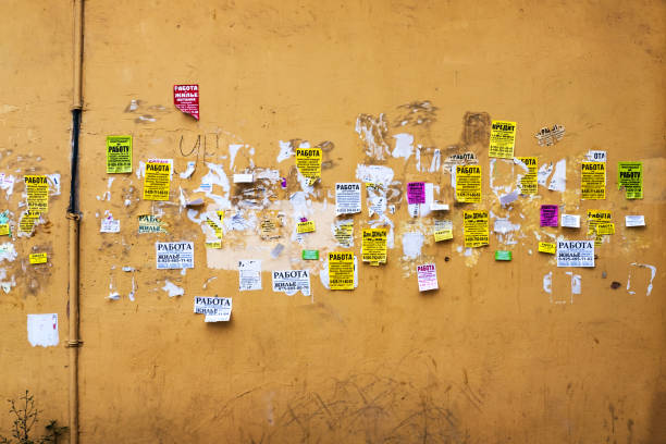 Russia, Podolsk, August 21, 2019. Wall of house with advertising, many advertisements on the city street