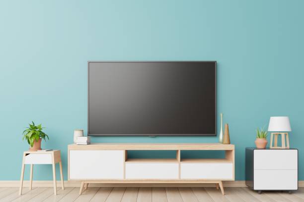 istock TV in live room and wall blue. 1184273930