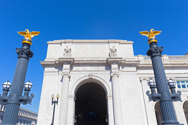 istock Decorative columns with eagle statues on top in front of the Union Station in Washington DC, USA. 1184283632