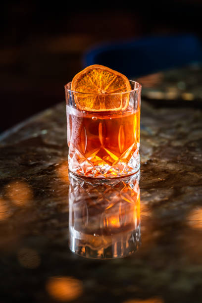istock Closeup Glass with Alcohol in Cocktail Bar 1184283947