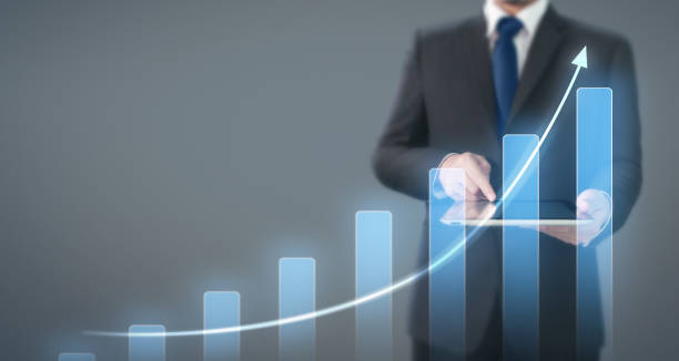 istock Businessman using digital tablet in hand.business idea 1184284013