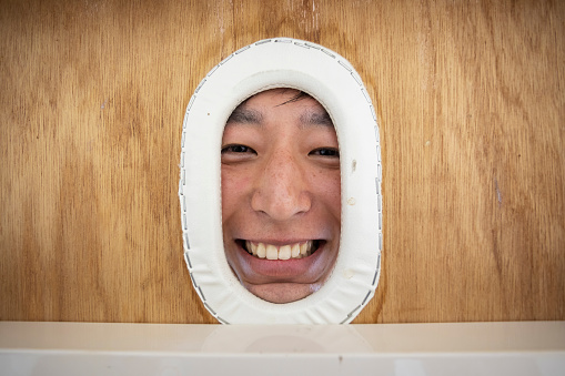 Happy face of a Japanese man getting a therapeutic massage