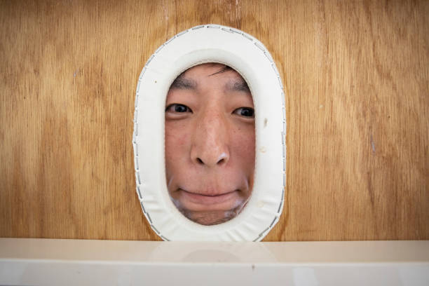 face of an asian man getting a massage - massage table imagens e fotografias de stock