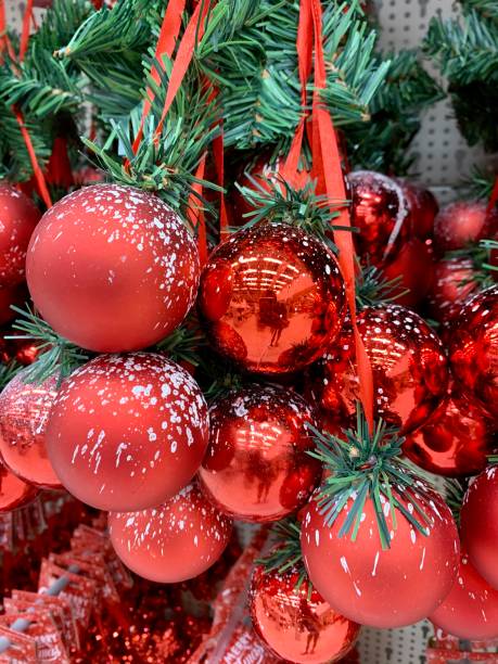 istock Christmas decoration red bauble balls hanging in the shop 1184305708