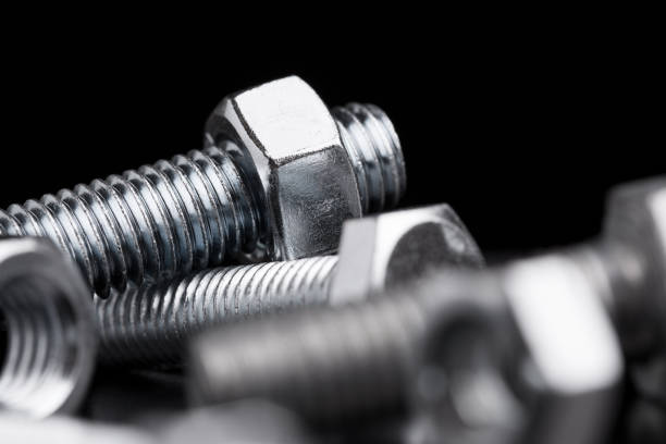 Bolts close-up on a black background.