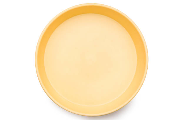 istock Yellow round plastic tray isolated on white background with clipping path. 1184310534