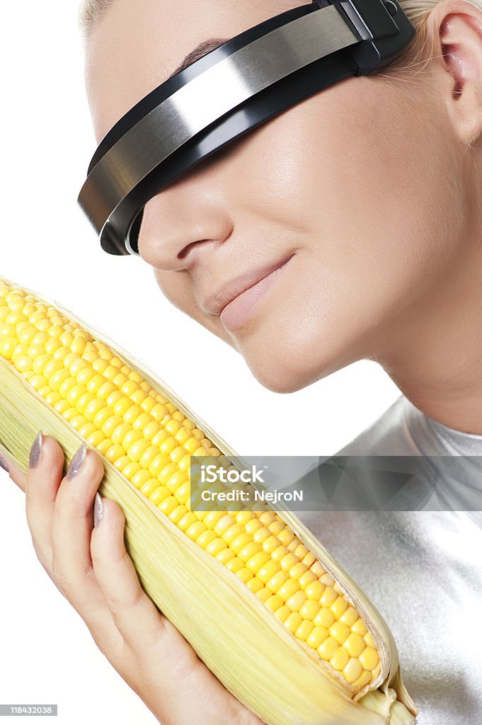 Cyber woman with a corn  Corn Stock Photo