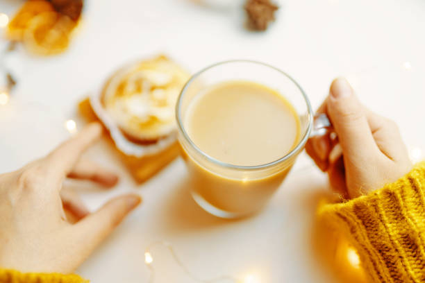 istock Coffee and cake with cream on the table. 1184322207