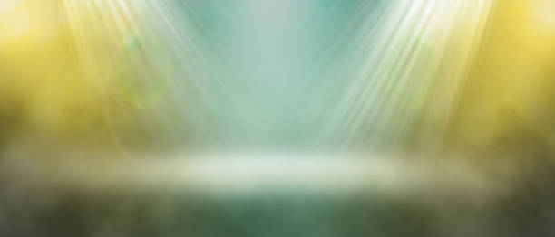 istock Abstract blurry concrete background. Illuminated show on the stage with copy space. An empty stage of the theater, lit by spotlights. 3d rendering 1184322296
