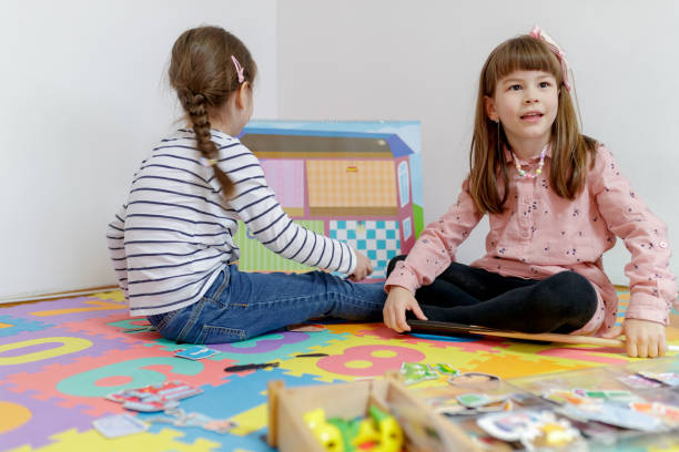 istock Two girls engaged in playful learning 1184324139