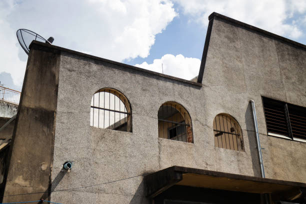 istock Old concrete grunge wall of building 1184325602