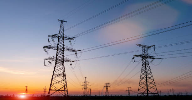 istock Electrical substation silhouette on the dramatic sunset background 1184328485