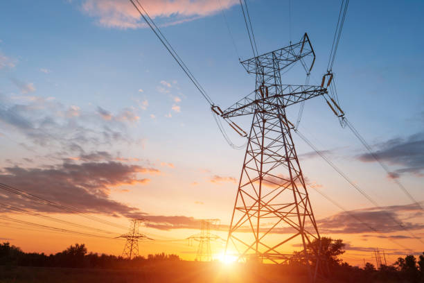 istock Electrical substation silhouette on the dramatic sunset background 1184328622