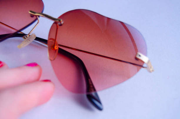 istock Cute pop heart shaped sunglasses 1184329036