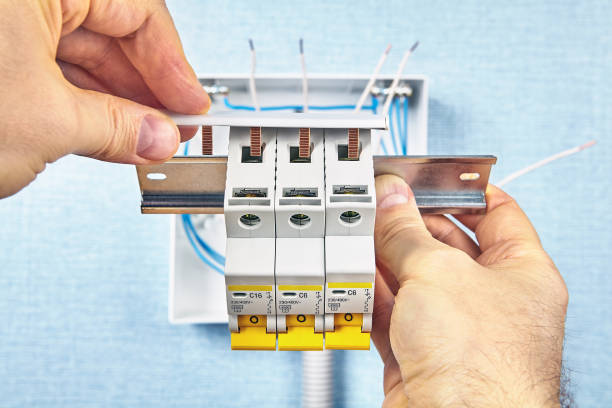 istock The automatic fuse or MCB  installing at home. 1184331660