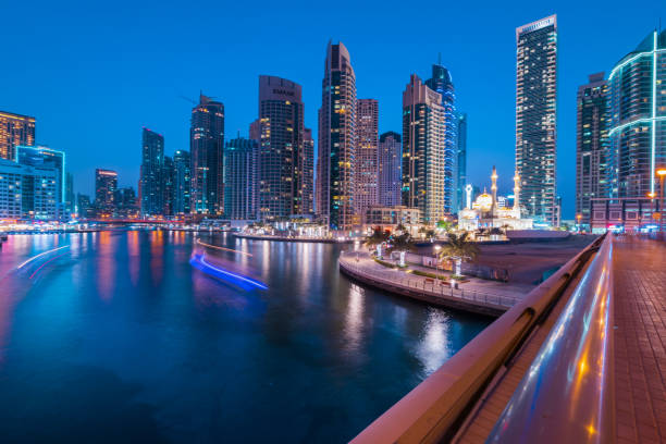 istock Dubai city at night with illuminated buildings. 1184332154