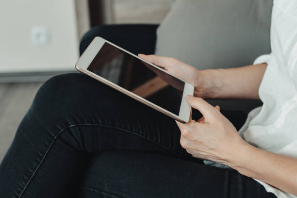 istock A picture of a young woman working on a tablet computer 1184334499