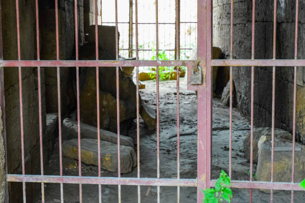 istock Lattices with lock in a closed passage in the fortress. 1184343270