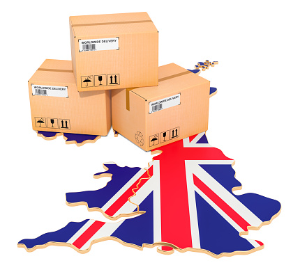 Parcels on the British map. Shipping in the Great Britain, concept. 3D rendering isolated on white background