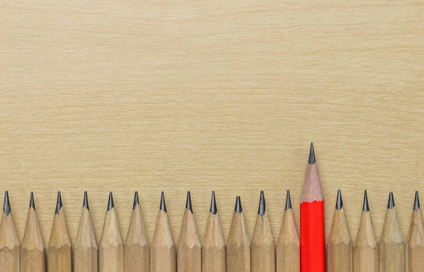 istock Different pencil standout show leadership concept. 1184345426
