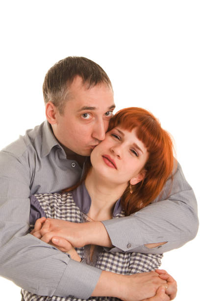 istock Husband kisses wife on a cheek 118434557