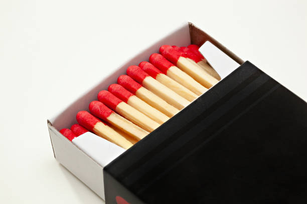 istock Close-Up Of Matchsticks In Box On White Background 1184346628