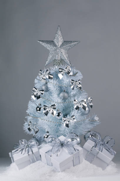 istock Christmas tree and gifts 1184346736