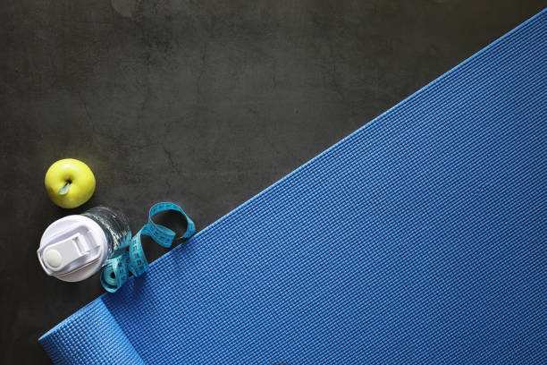 istock Mat for practicing yoga on the floor. Healthy lifestyle. 1184348704