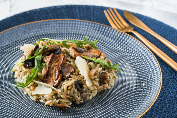 istock porcini and black truffle Risotto 1184348837