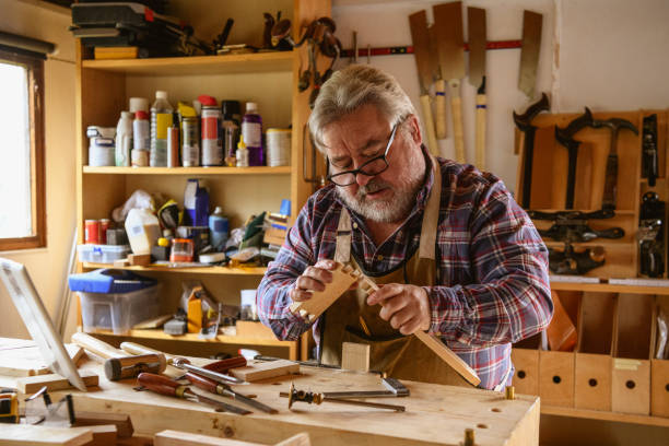 istock Mature owner of carpentry business working 1184350161