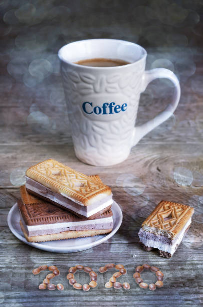 istock Cookies and coffee on old boards, Christmas. Toned 1184350361