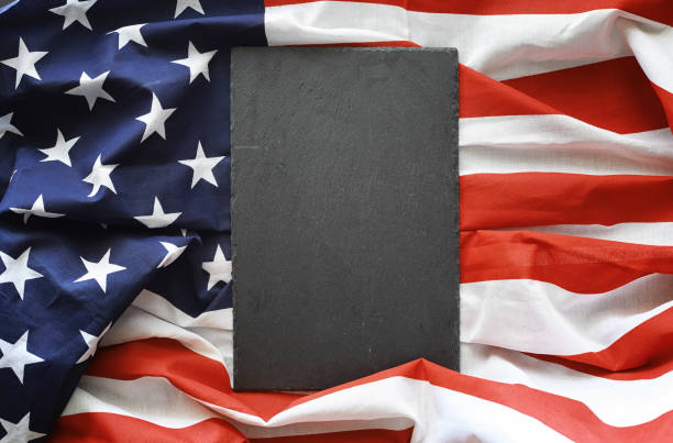 istock American flag on a black background. Space for text. 1184350503