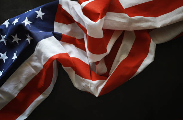 istock American flag on a black background. Space for text. 1184350541