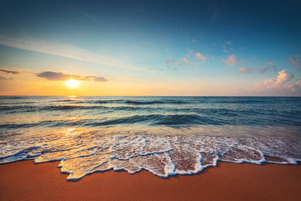 istock Beautiful sunrise over the tropical sea 1184355282
