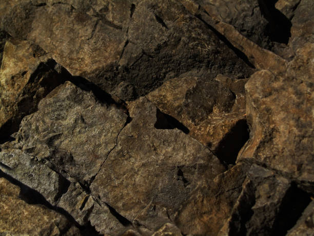 istock Mountain stones close-up. Rock texture. Grunge stone background. Abstract stone backdrop. 1184357056