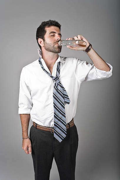 Drunk, worn out business man stock photo