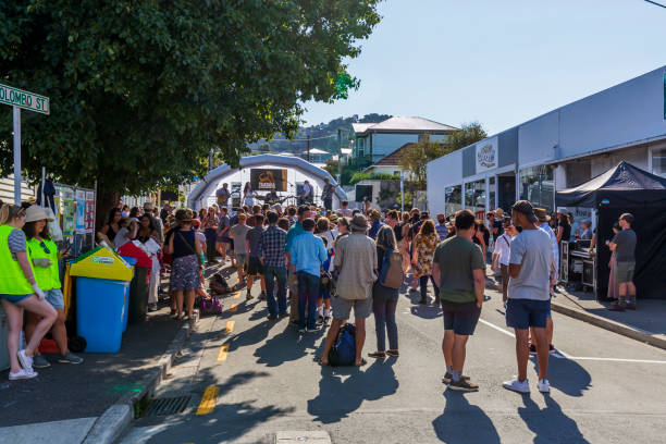 People enjoying the fantastic live bands at Newtown Vintage Market in Wellington, New Zealand. Wellington, New Zealand - March 03, 2019: People enjoying the fantastic live bands at Newtown Vintage Market in Wellington, New Zealand. newtown stock pictures, royalty-free photos & images