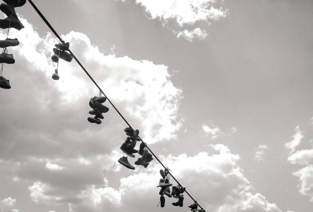 istock shoes on rope, Metronome Prague 1184359803