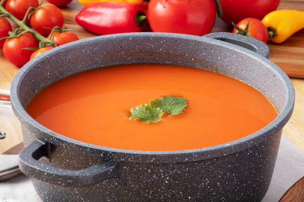 istock tomato soup on the wooden background 1184363513