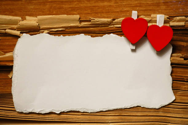 istock white sheet paper love notes and heart shape 1184365131