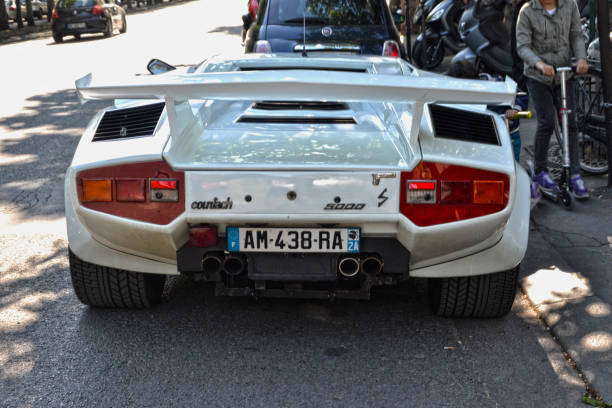 Paris, France - April 18th 2015 : white lamborghini countach 5000 parked in the Champs Elysees avenue.