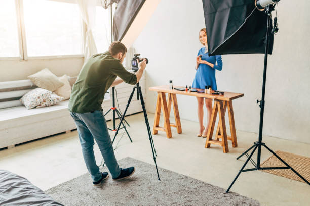 istock blonde charming makeup artist giving recommend to customers 1184365655