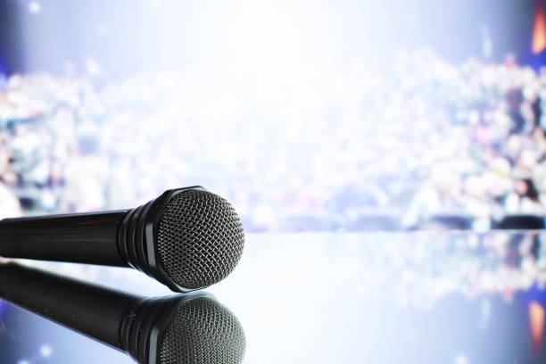 istock The microphone on the stage in front of the hall. Performance on stage. 1184365770