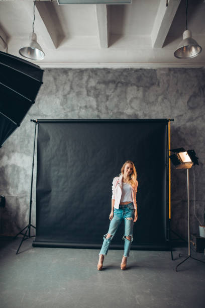 istock fasion cool lovely model with positive mood working at photo session 1184366072